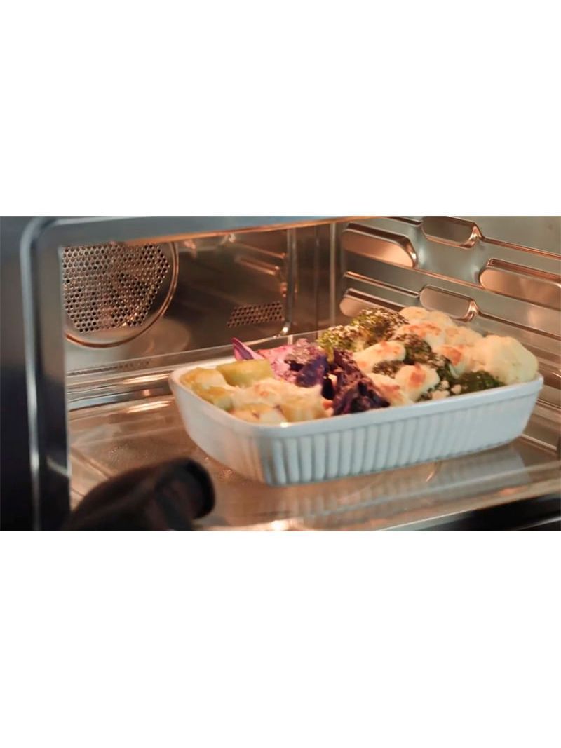 Cozimento com calor ventilado atua como forno elétrico, distribuindo o calor de forma rápida e homogênea para resultados mais saborosos.