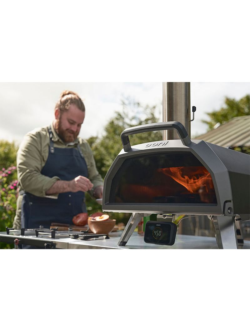 Termômetro digital com sonda que permite monitoramento preciso da temperatura interna garantindo controle exato do ponto de carnes massas e assados.