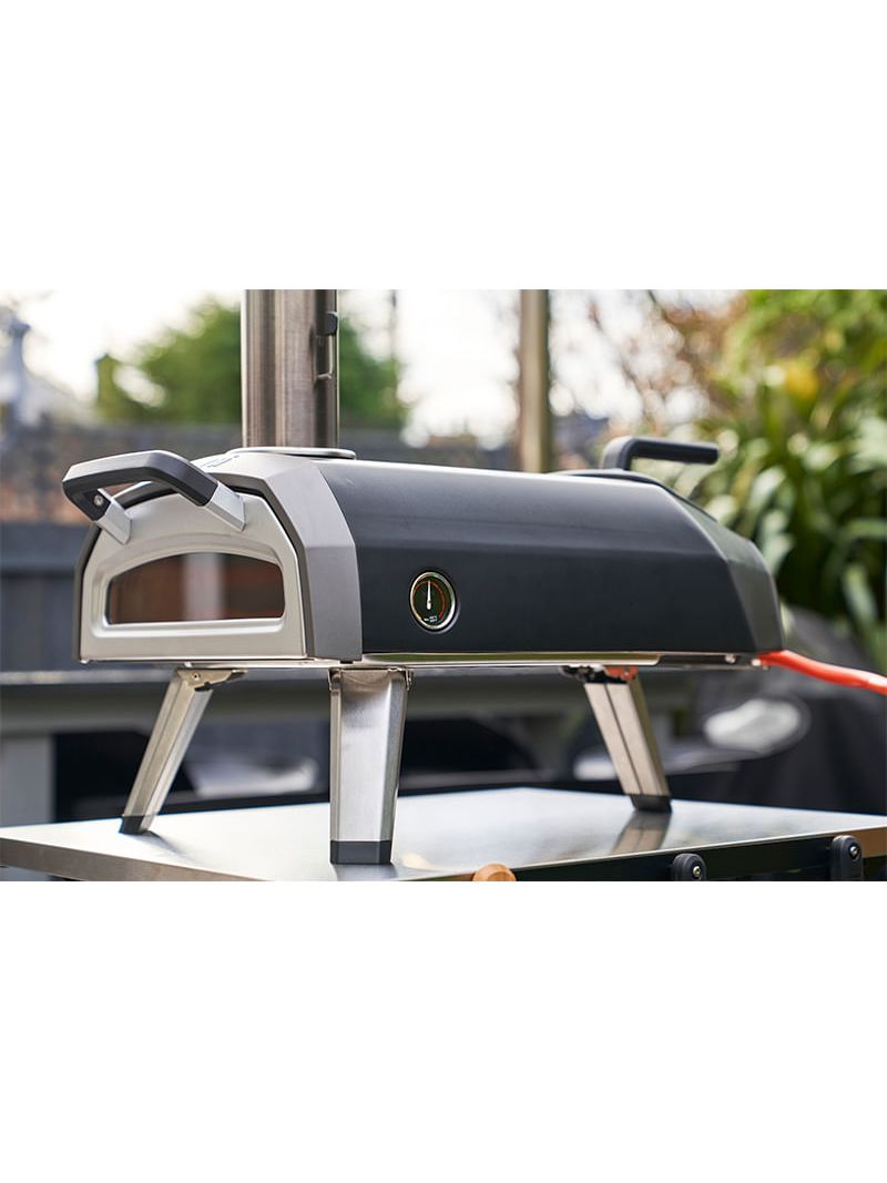 Termômetro digital com sonda que permite monitoramento preciso da temperatura interna para controle exato de carnes massas e assados.